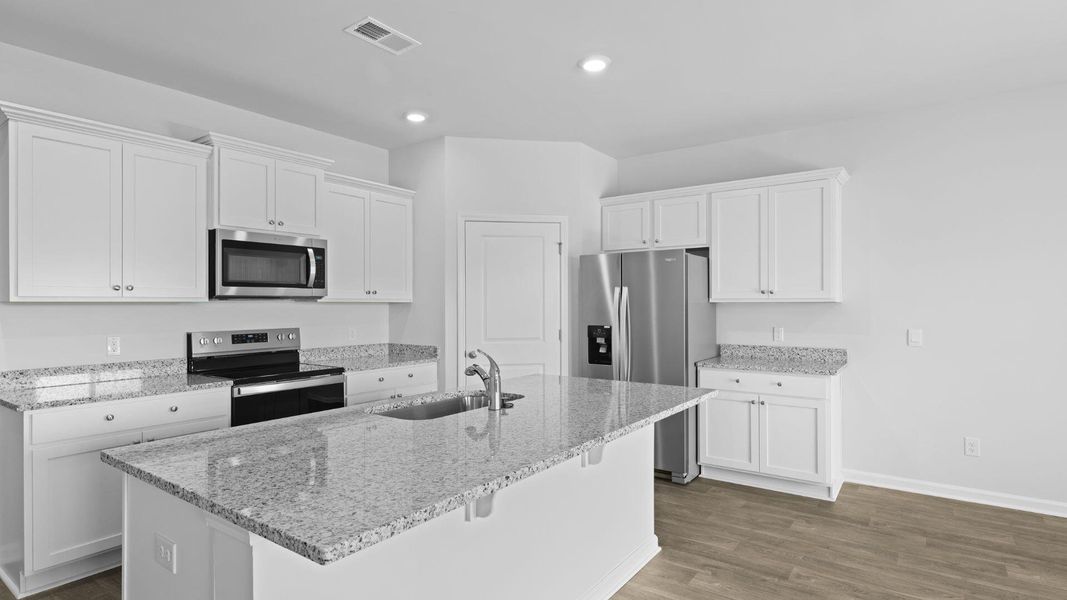 Furnished interior view inside a new home in The Ranch, Holly Hill (Image 7).