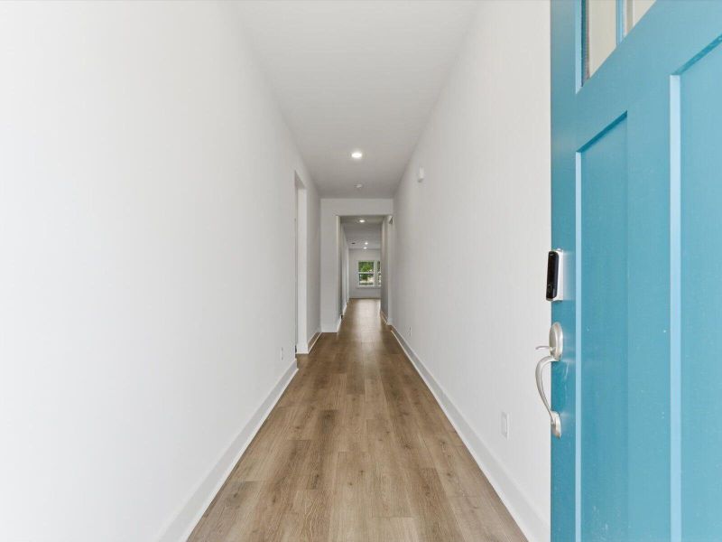 Spacious, unfurnished interior of a new home in The Coves at Lakes of Cane Bay, Summerville (Image 21).