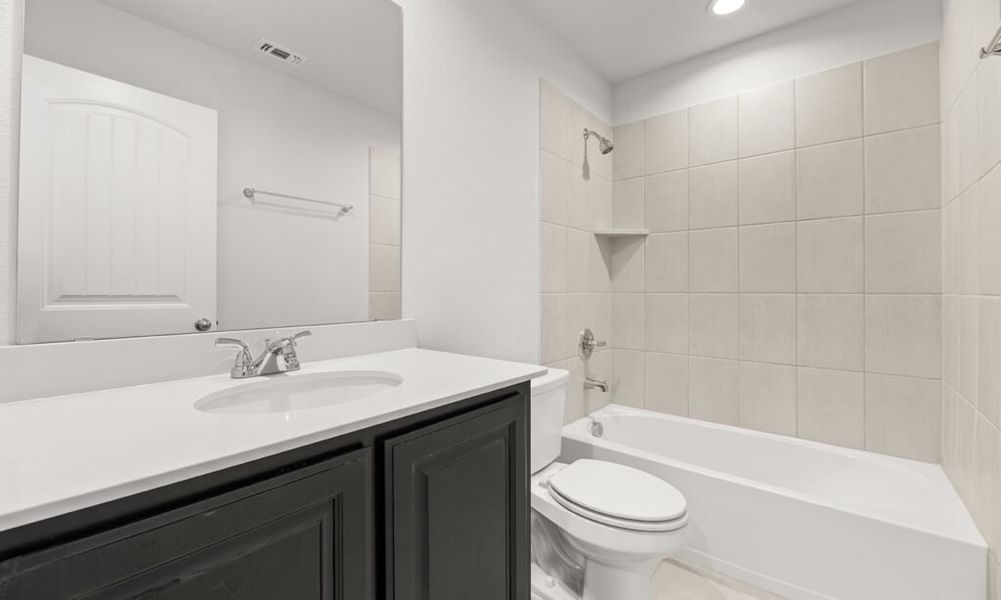 Representative exterior photo of a completed home built from the Granbury by Impression Homes in Main Street Village, Mansfield, TX (Image 20). Representative exterior photo of a completed home built from the Granbury by Impression Homes in Main Street Village, Mansfield, TX (Image 20).