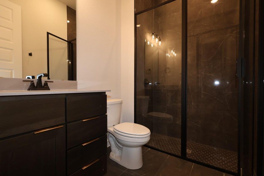 Furnished interior view inside a new home in Wolf Ranch, Georgetown (Image 9).