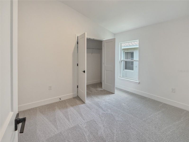 Spacious, unfurnished interior of a new home in Harmony Central, St. Cloud (Image 13).