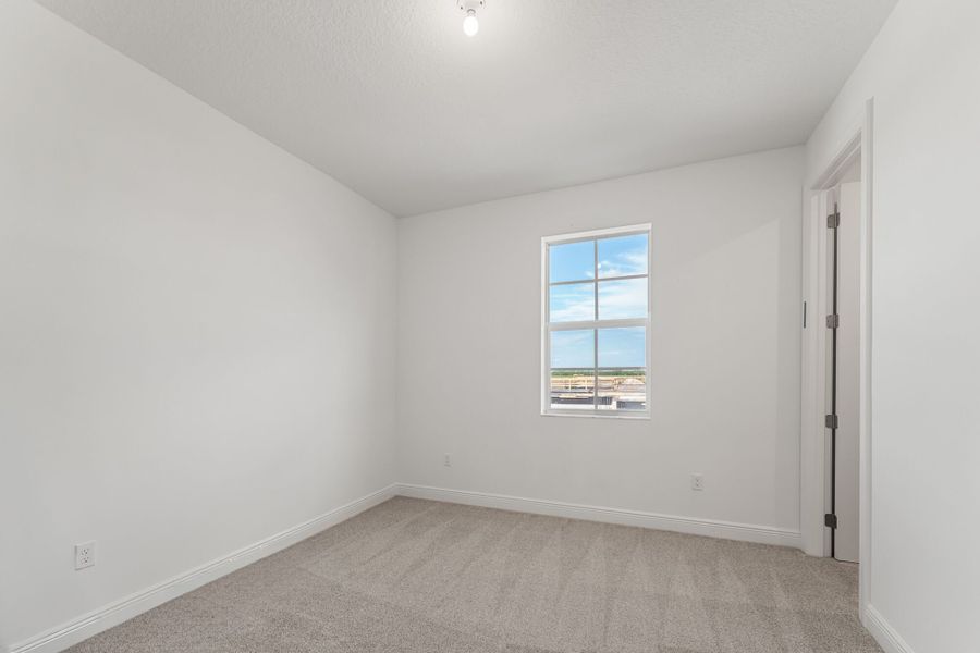 Representative unfurnished interior of a home built from the Zinnia by Mattamy Homes in Newfield, Palm City (Image 10).