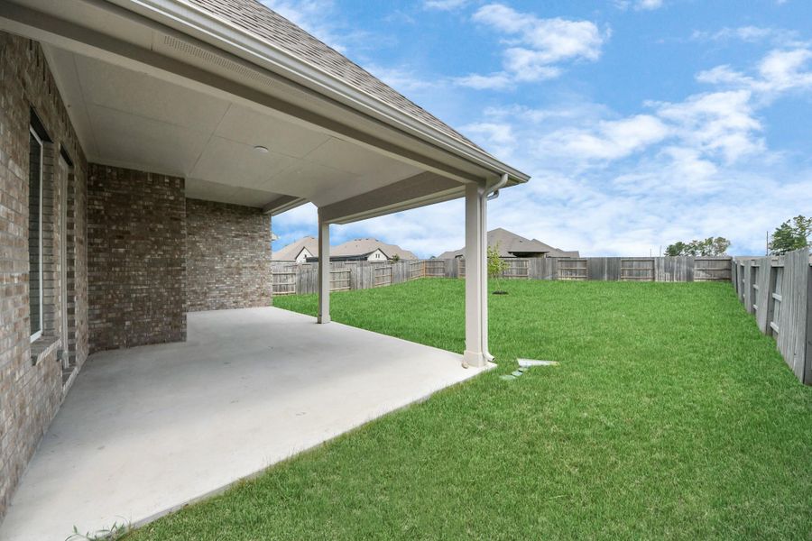 Front exterior of a new home in ARTAVIA: Hilltop Collection, Conroe, TX, highlighting curb appeal (Image 21). Front exterior of a new home in ARTAVIA: Hilltop Collection, Conroe, TX, highlighting curb appeal (Image 21).