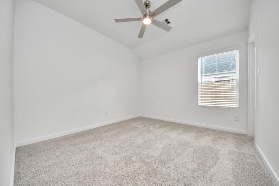 Secondary bedroom features plush carpeting, large windows that let in plenty of natural light, bright paint, and spacious closets. Secondary bedroom features plush carpeting, large windows that let in plenty of natural light, bright paint, and spacious closets.