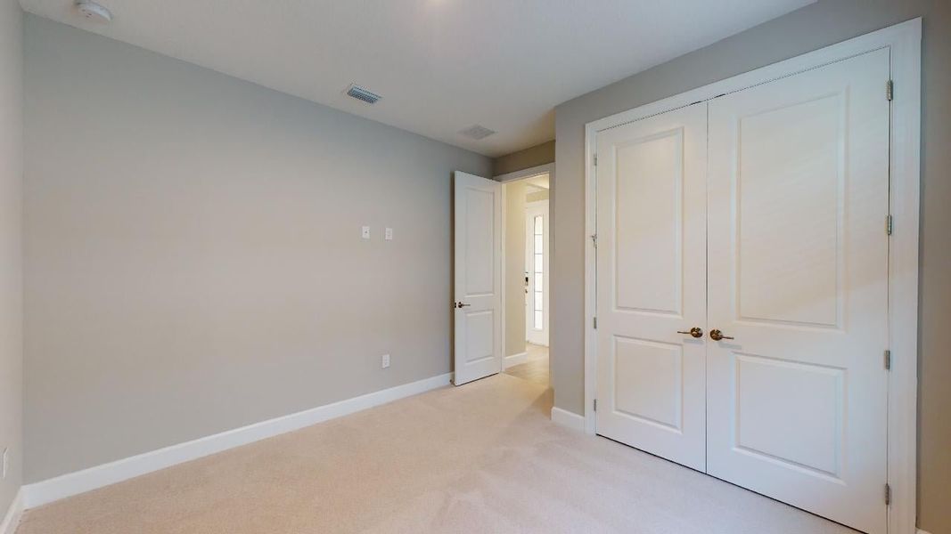 Representative unfurnished interior of a home built from the Azzurro by Taylor Morrison in Esplanade by the Islands, Naples (Image 22).