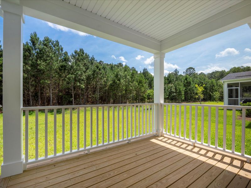 Exterior details and patio area of a home in The Coves at Lakes of Cane Bay, Summerville (Image 4).