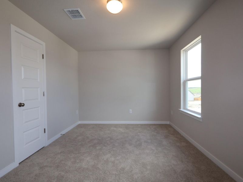 Spacious, unfurnished interior of a new home in Cascades at Onion Creek, Austin (Image 5).