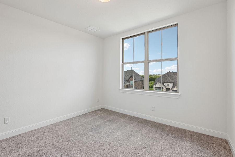 Spacious, unfurnished interior of a new home in 6 Creeks, Kyle (Image 31).