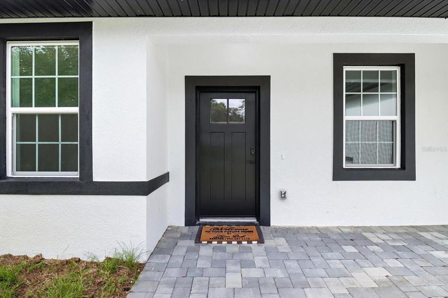 Front exterior of a new home in , Citrus Springs, FL, highlighting curb appeal (Image 16).