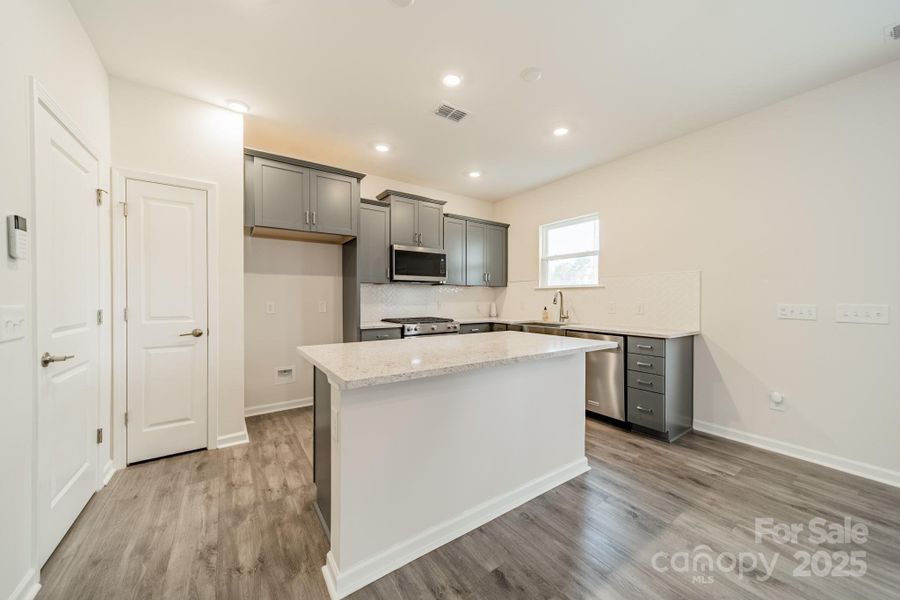 Furnished interior view inside a new home in Stewarts Landing, Charlotte (Image 6).