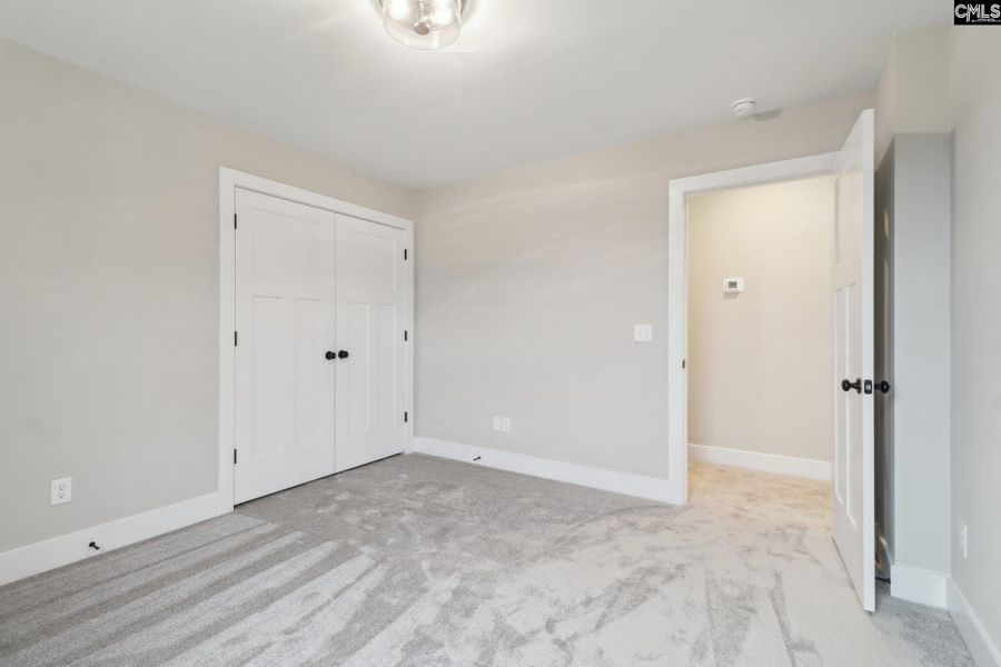 Spacious, unfurnished interior of a new home in Collins Cove, Chapin (Image 25). Spacious, unfurnished interior of a new home in Collins Cove, Chapin (Image 25).