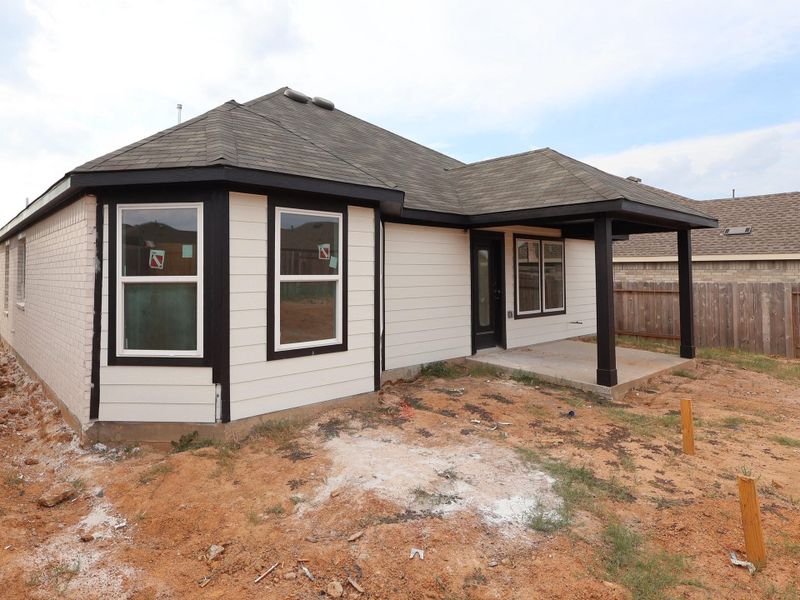 Exterior details and patio area of a home in Magnolia Ridge, Magnolia (Image 3).