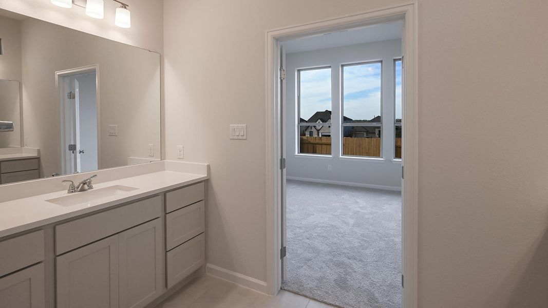 Furnished interior view inside a new home in Crosswinds 40', Kyle (Image 12).