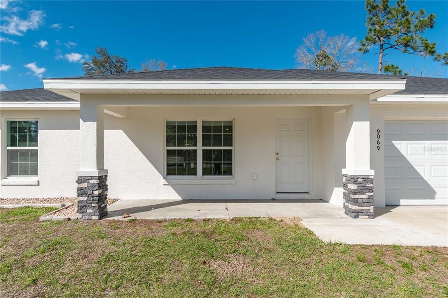 Exterior details and patio area of a home in , Summerfield (Image 19).