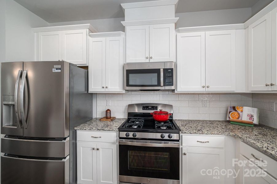 Furnished interior view inside a new home in , Huntersville (Image 11).