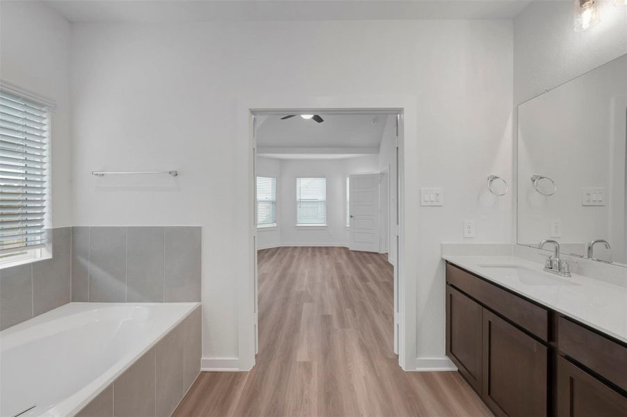 Furnished interior view inside a new home in Lone Star Landing, Montgomery (Image 9).