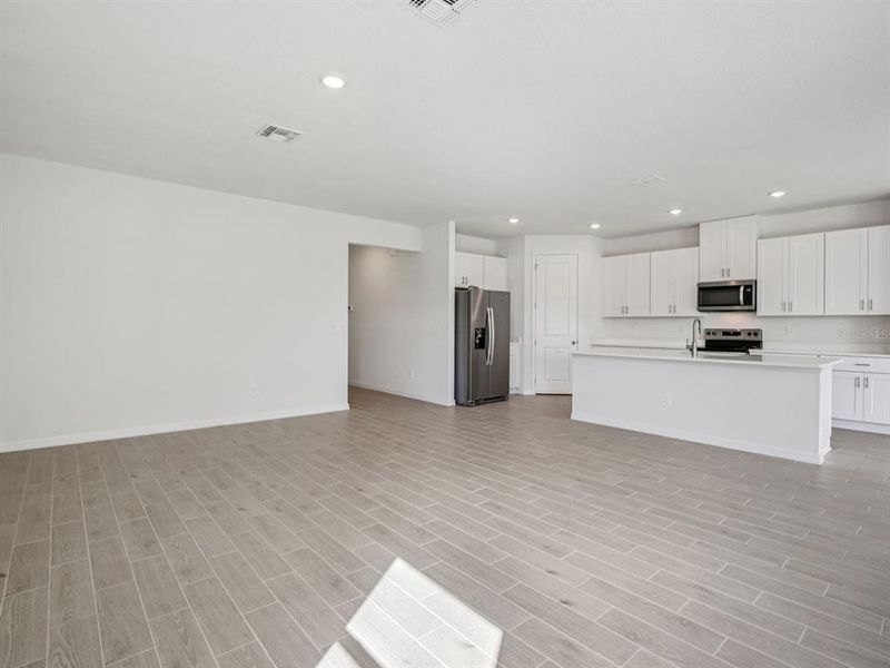 Spacious, unfurnished interior of a new home in Coasterra - Reserve Series, Palmetto (Image 24).