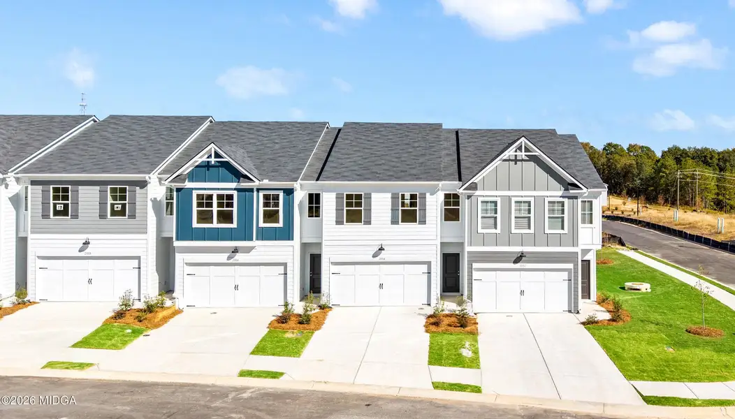 Front exterior of a new home in Highland Pointe, Macon, GA, highlighting curb appeal (Image 1). Front exterior of a new home in Highland Pointe, Macon, GA, highlighting curb appeal (Image 1).