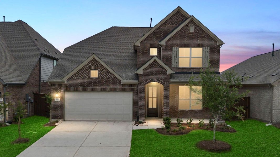 Front exterior of a new home in Brookewater, Rosenberg, TX, highlighting curb appeal (Image 1).