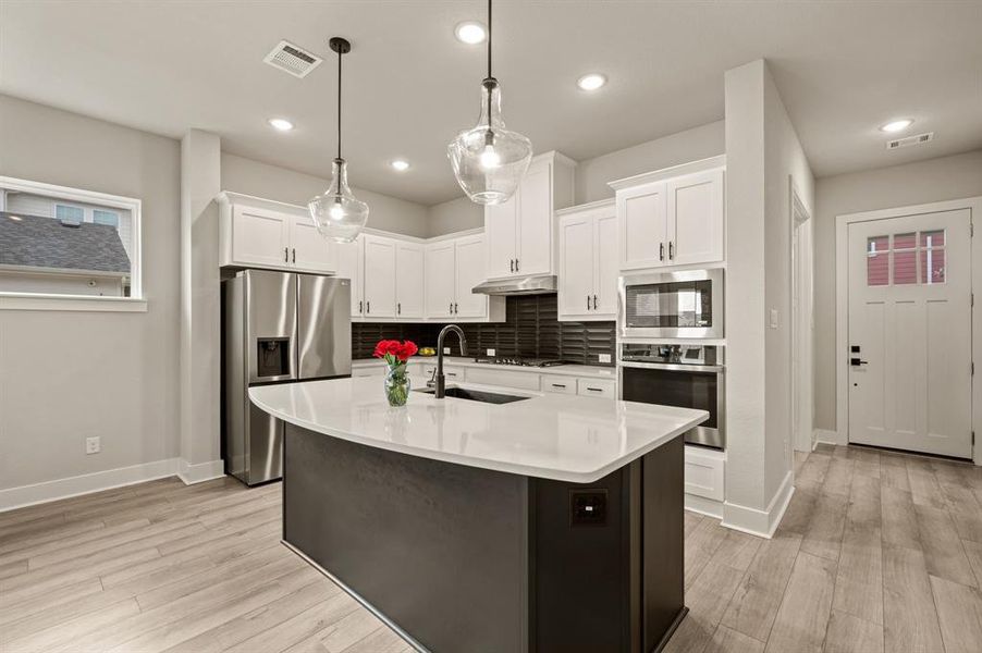 Furnished interior view inside a new home in HomeTown Garden, North Richland Hills (Image 14). Furnished interior view inside a new home in HomeTown Garden, North Richland Hills (Image 14).