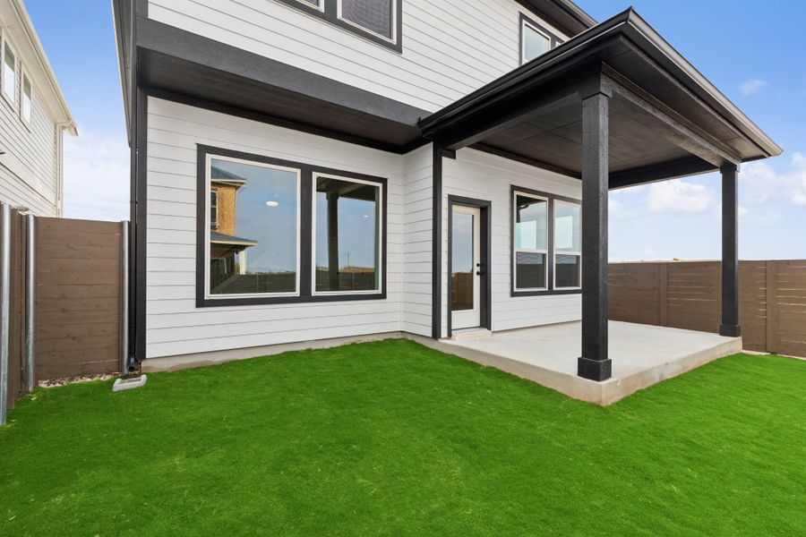 Exterior details and patio area of a home in Double Creek Crossing – Craftsman Series, Round Rock (Image 3).