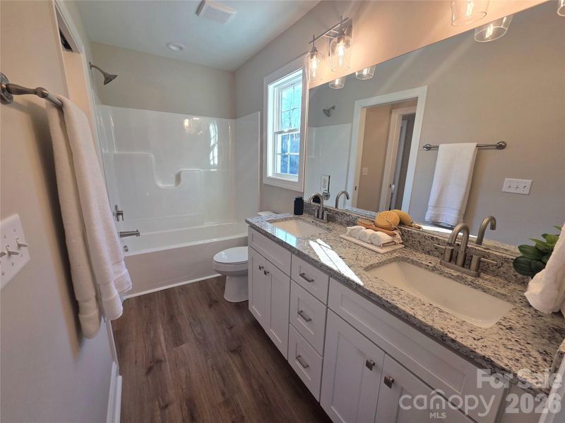 Furnished interior view inside a new home in , Hickory (Image 9).