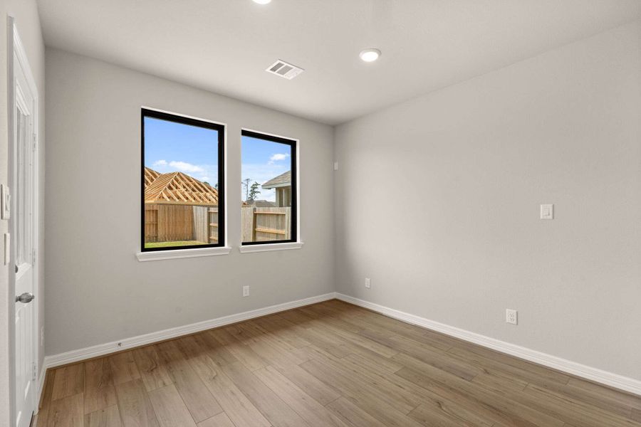 Dining area features large windows allowing plenty of light to shine in