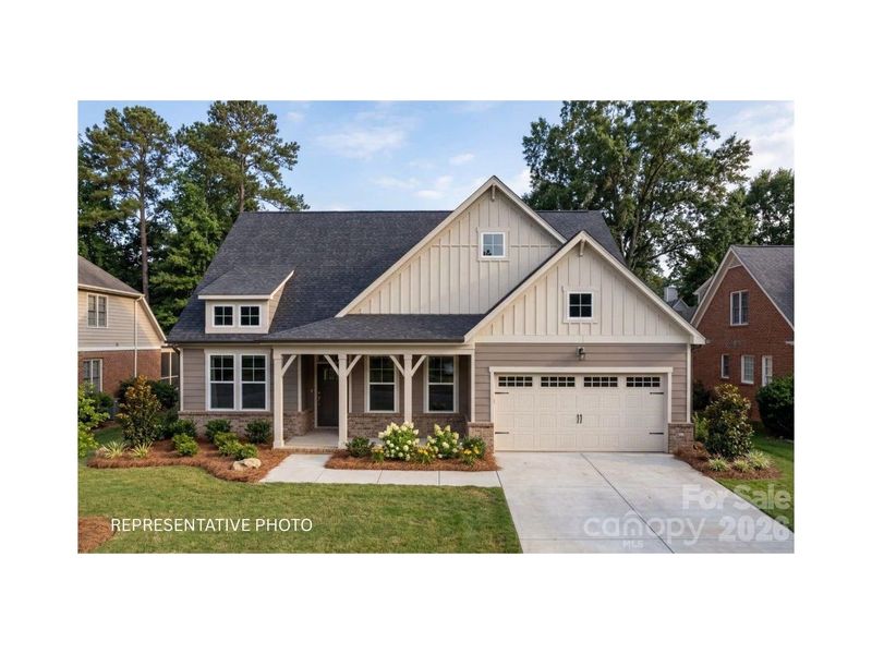 Front exterior of a new home in Windgate, Mooresville, NC, highlighting curb appeal (Image 1). Front exterior of a new home in Windgate, Mooresville, NC, highlighting curb appeal (Image 1).