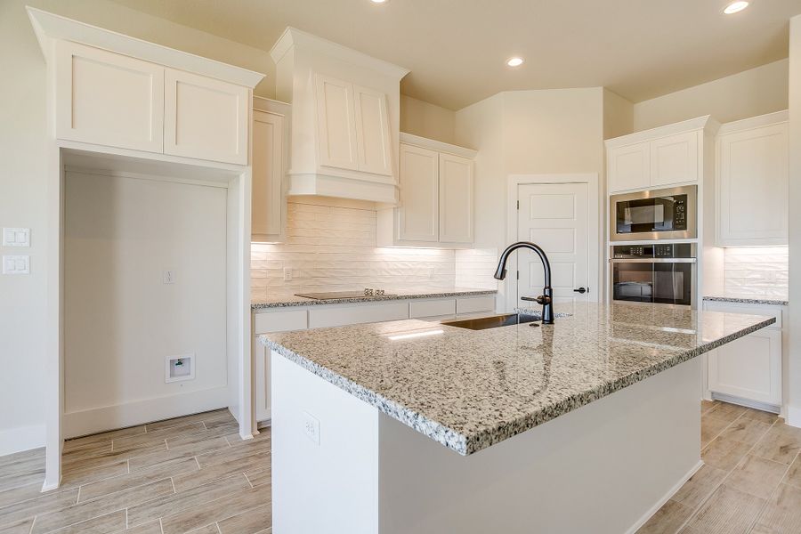 Representative furnished interior of a home built from the The Lily by Kenmark Homes in Rocky Top Ranch, Reno (Image 9). Representative furnished interior of a home built from the The Lily by Kenmark Homes in Rocky Top Ranch, Reno (Image 9).