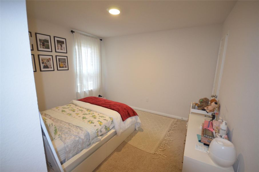 Carpeted bedroom with recessed lighting Carpeted bedroom with recessed lighting