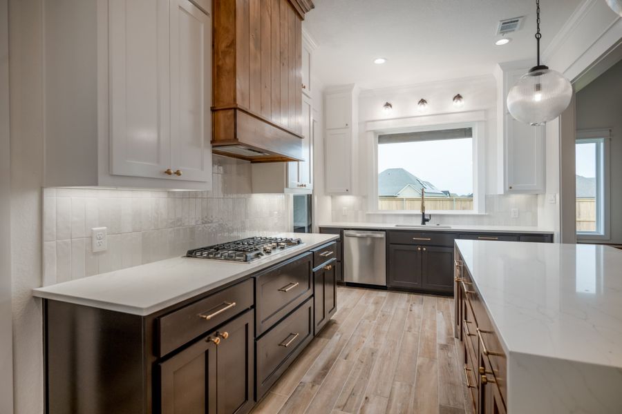 Furnished interior view inside a new home in Greens Prairie Reserve, College Station (Image 7).