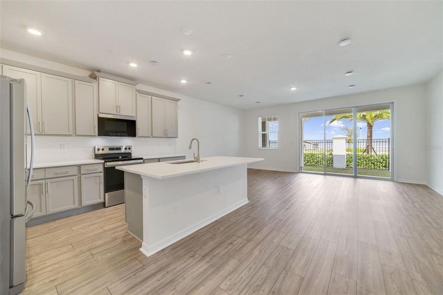 Furnished interior view inside a new home in Towns at Greenleaf, Oviedo (Image 2). Furnished interior view inside a new home in Towns at Greenleaf, Oviedo (Image 2).