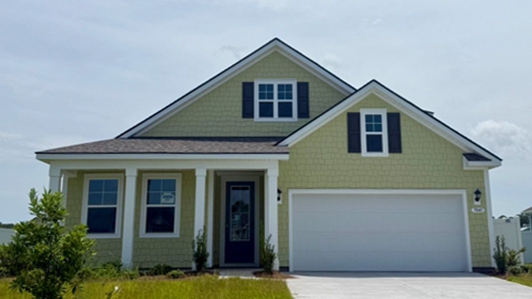 Front exterior of a new home in Auberon Woods, Conway, SC, highlighting curb appeal (Image 1). Front exterior of a new home in Auberon Woods, Conway, SC, highlighting curb appeal (Image 1).
