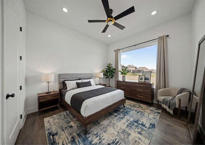 Virtually Staged - Bedroom with a closet, dark wood-style floors, a ceiling fan, and recessed lighting