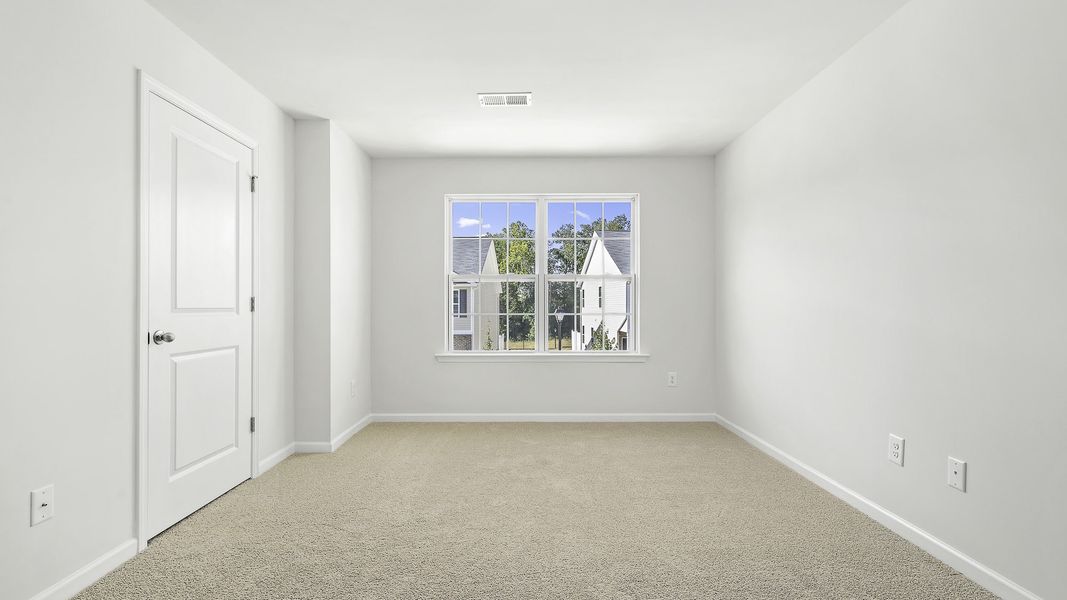 Spacious, unfurnished interior of a new home in North Village Townes, Greensboro (Image 14).