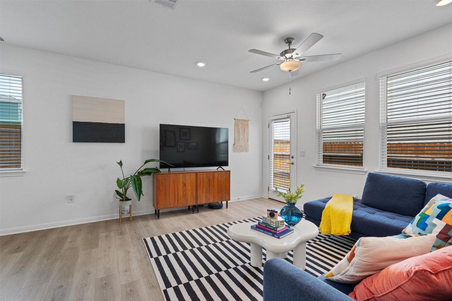 Living room featuring  recessed lighting and ceiling fan