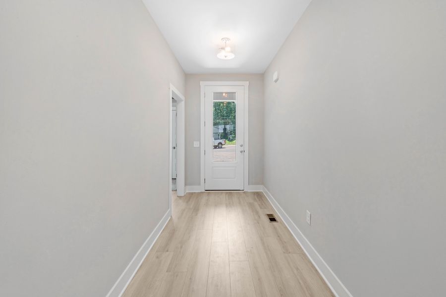 Representative unfurnished interior of a home built from the One Story Farmhouse by Norfleet Builders in Cambria, White House (Image 8).