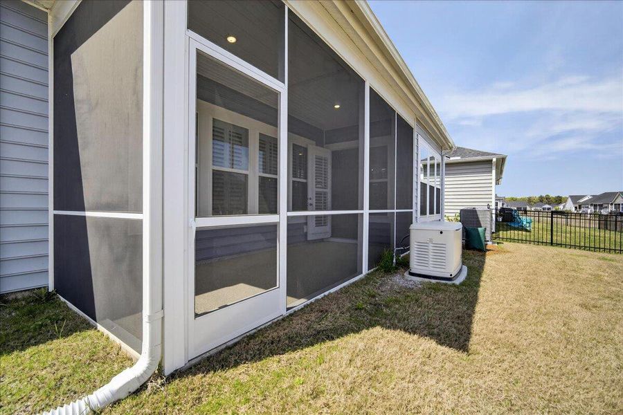 Exterior details and patio area of a home in Horizons at Summers Corner | 55+, Summerville (Image 26).