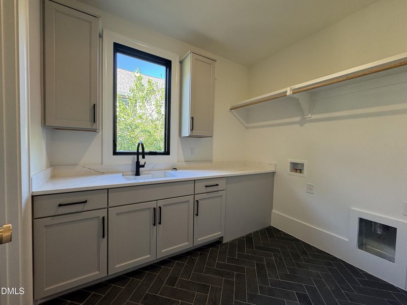Laundry off of Primary suite