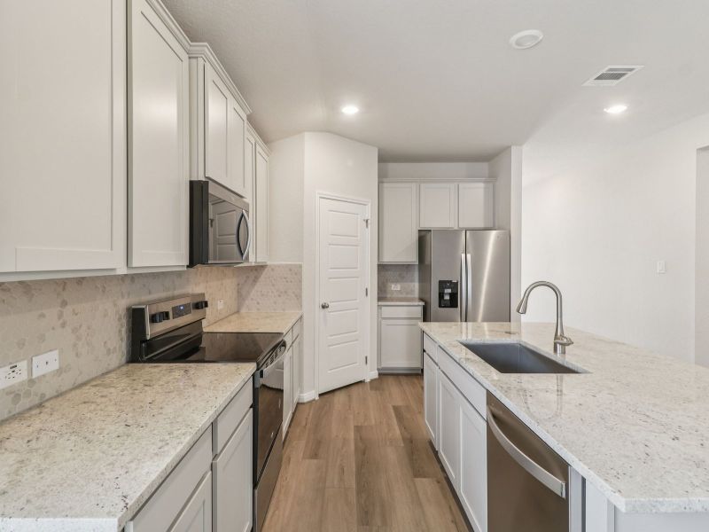 Furnished interior view inside a new home in Sagebrooke - Premier Series, San Antonio (Image 6).