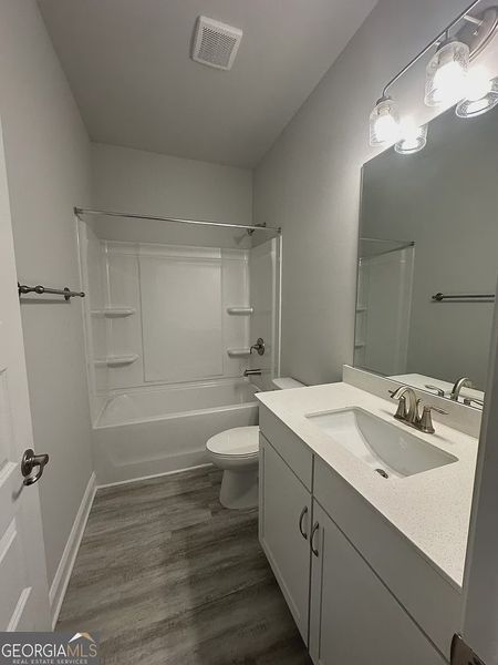 Furnished interior view inside a new home in Mirror Lake at South Harbour, Villa Rica (Image 7).