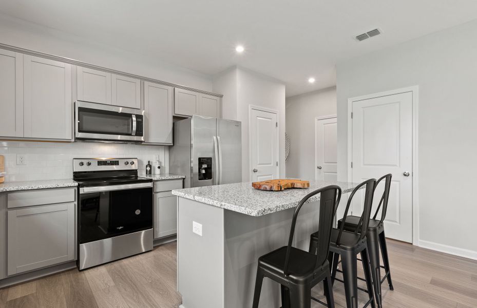Furnished interior view inside a new home in Carpenter Falls, Durham (Image 4).