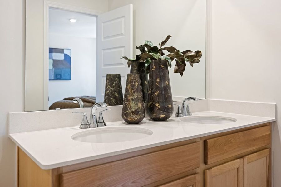 Dual-sink vanity at primary bath