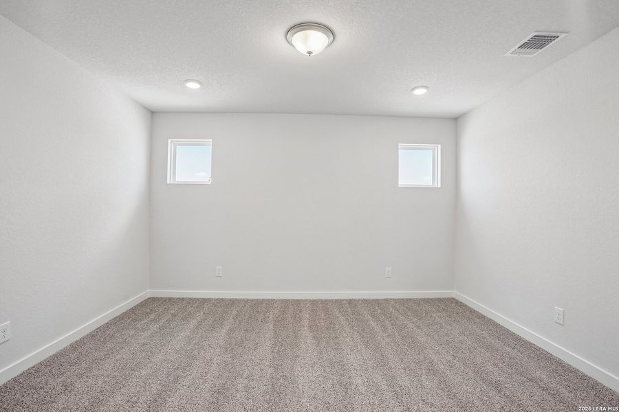 Spacious, unfurnished interior of a new home in August Fields, New Braunfels (Image 23).