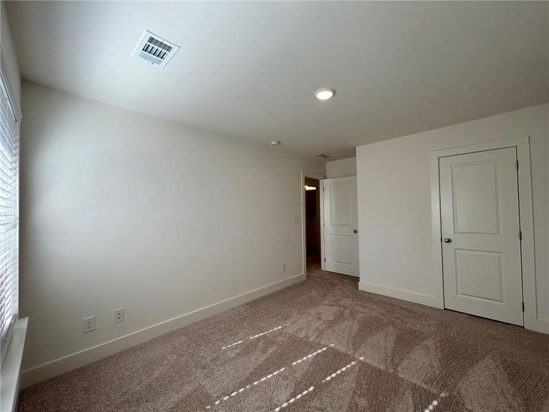 Unfurnished room featuring carpet floors