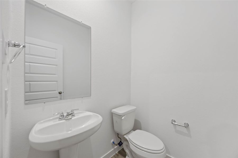 Furnished interior view inside a new home in Grand West, Houston (Image 8).