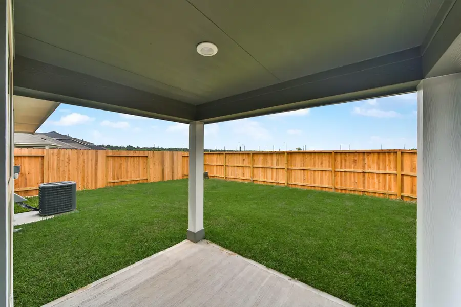 Sample photo of completed home with similar floor plan. As-built color and selections may vary.