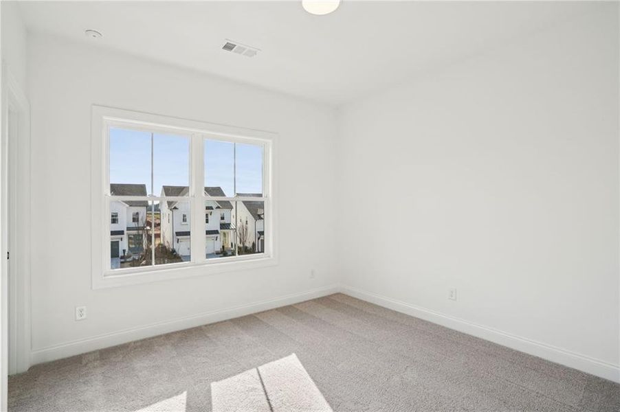 Spacious, unfurnished interior of a new home in Palisades Townhomes, Cumming (Image 21).