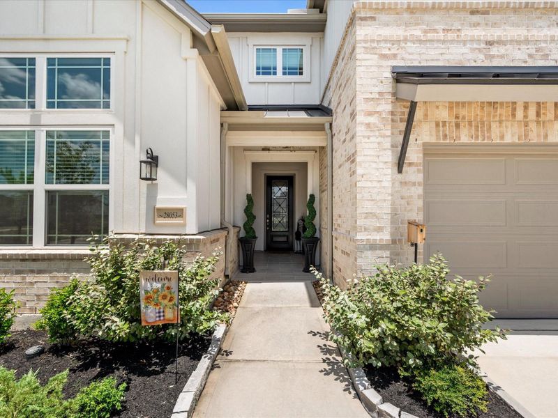 Exterior details and patio area of a home in , Spring (Image 27).