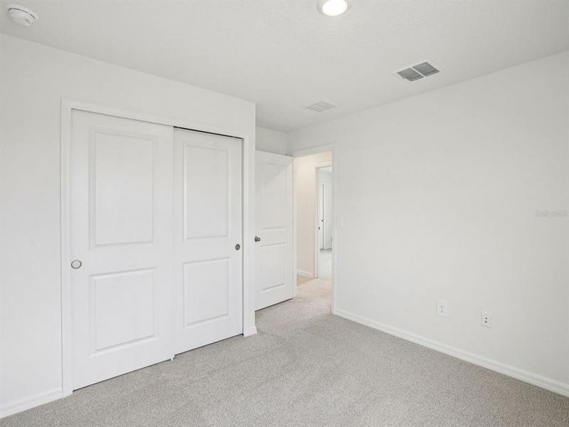 Spacious, unfurnished interior of a new home in Magnolia Bay - Classic Series, Nokomis (Image 14).